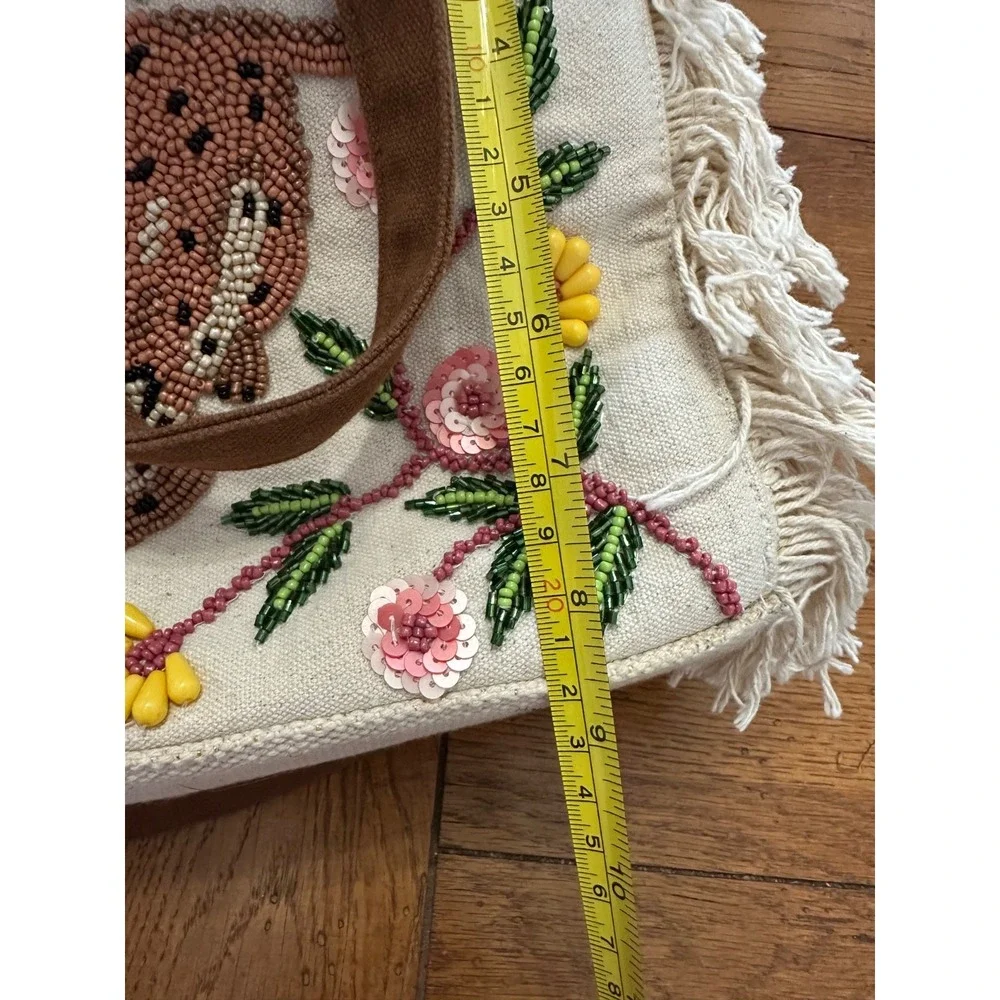 America and beyond cream‎ fringed purse with beaded animals and palm tree